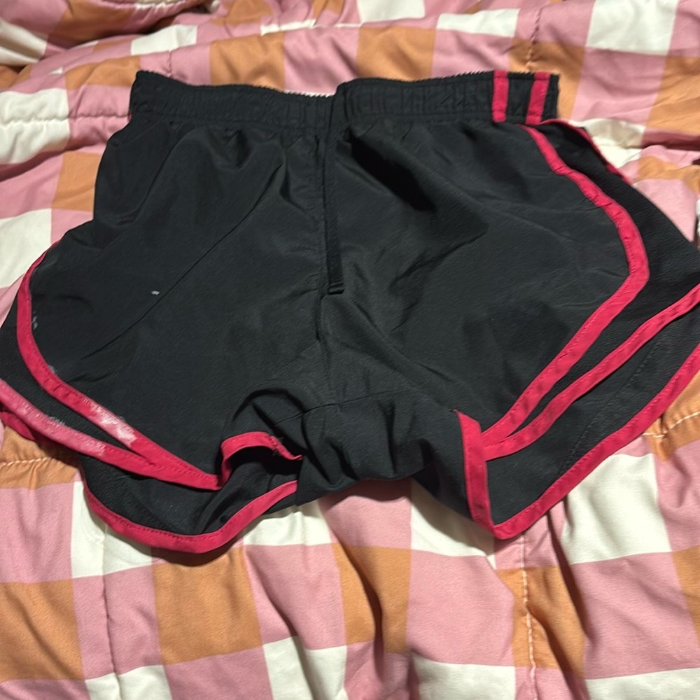 Black and pink Nike shorts